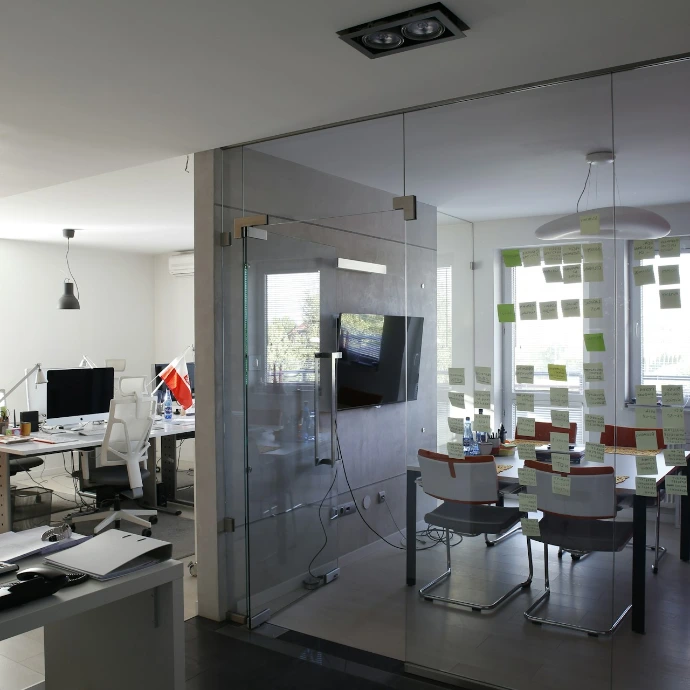 black and gray flat screen computer monitor and dining room